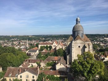 High angle view of town against cloudy sky