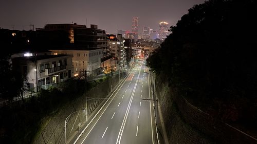 High angle view of road amidst buildings in city