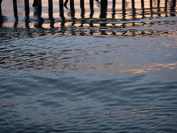 Scenic view of river at sunset