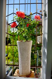 Flower vase on window sill