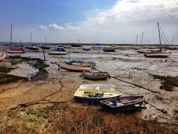 Boats moored at harbor