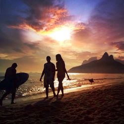 Scenic view of beach at sunset