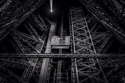 Low angle view of eiffel tower with elevator