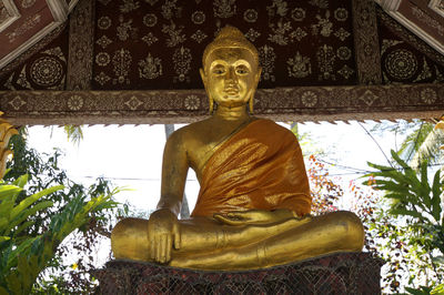 Low angle view of buddha statue