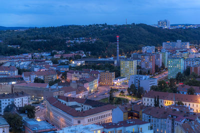 High angle view of illuminated buildings in city