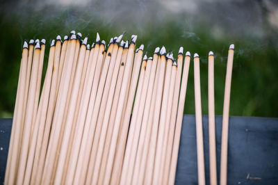 Close-up of burning incenses