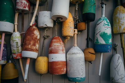 Close-up of various objects hanging on wall
