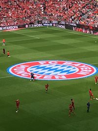 High angle view of people on soccer field