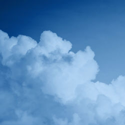 Low angle view of clouds in blue sky