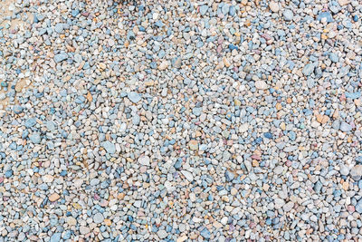 Sea stones floor texture for background.