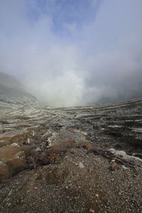 Scenic view of land against sky