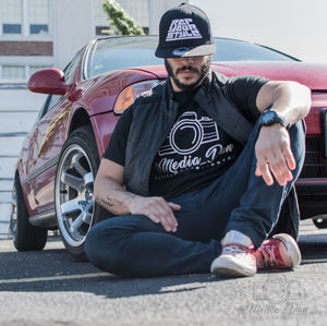 Portrait of man sitting in car