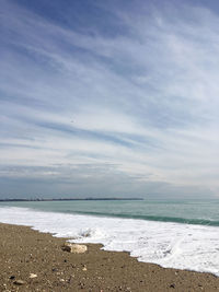 Scenic view of beach against sky