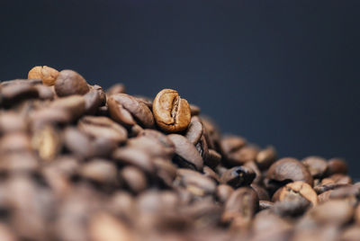 Close-up of coffee beans on table