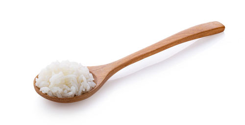 Close-up of cake against white background