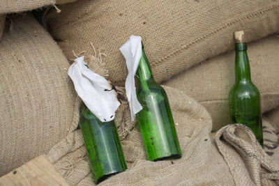 High angle view of bottles on table