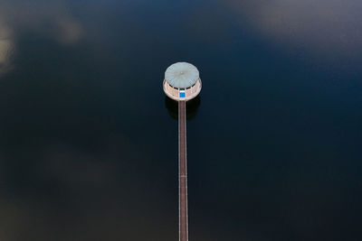 Low angle view of pole against sky at night