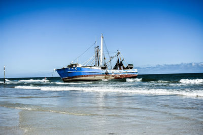 Shrimp boat run aground in ormond beach, fl