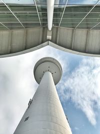 Low angle view of building against cloudy sky