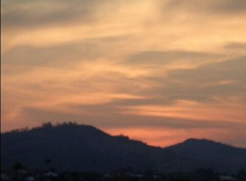 Scenic view of mountains at sunset