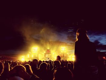 People enjoying music concert