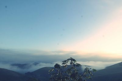 Scenic view of mountains against sky during sunset