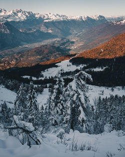 Scenic view of snowcapped mountains against sky during winter