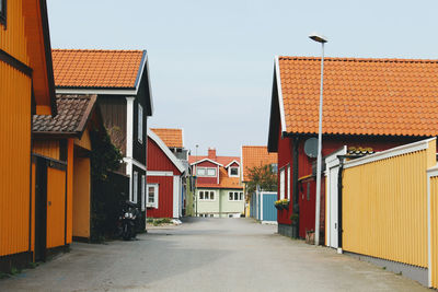 Houses against sky in town