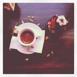 Directly above shot of coffee cup on table