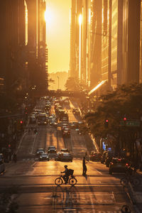 People on city street at night