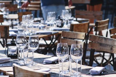 Empty wineglasses on table at restaurant