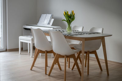 Empty chairs and table at home