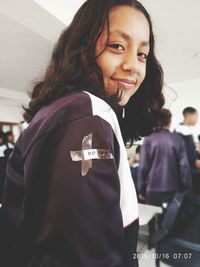 Portrait of a smiling young woman