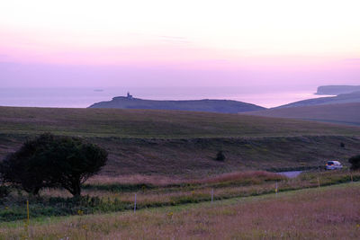 Scenic view of landscape against sky during sunset