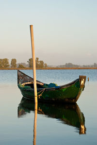 Boat in sea against clear sky