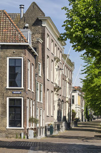 Canal side traditional housing in schiedam, holland