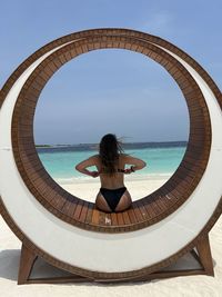 Low angle view of woman in kihaa maldives 