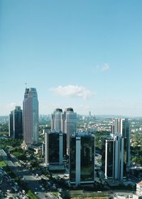 Modern buildings in city against sky