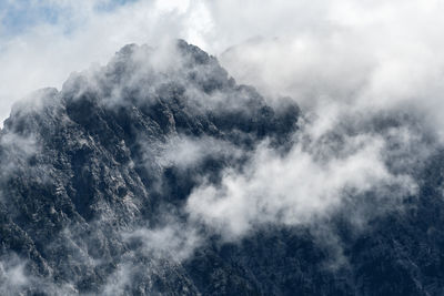 Low angle view of mountains against sky