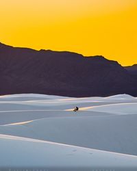 Scenic view of yellow mountain during sunset