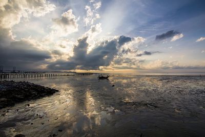 Scenic view of sea against sky at sunset