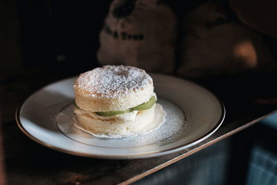 Close-up of cake in plate on table