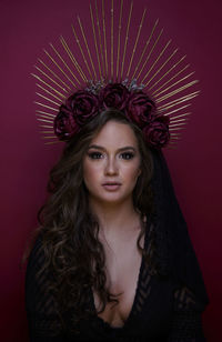 Portrait of young woman wearing headpiece