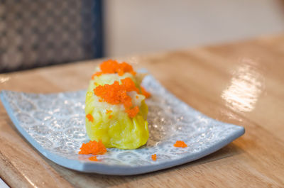 Close-up of ice cream in plate on table