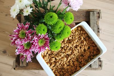 High angle view of flower pot on table wirh crumble