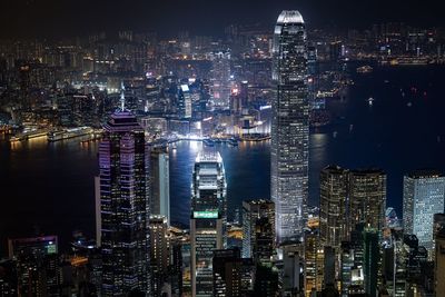 Aerial view of city lit up at night