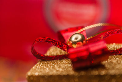 Close-up of christmas decoration on red box