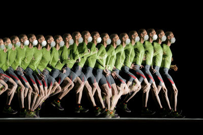 Photograph of a runner in a long exposure with stroboscopic flashes. shot at 20 hz.