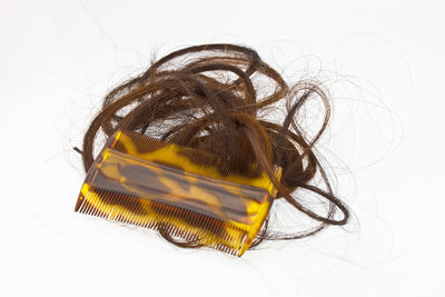 Close-up of a woman over white background