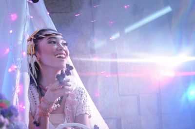 Portrait of young woman looking away